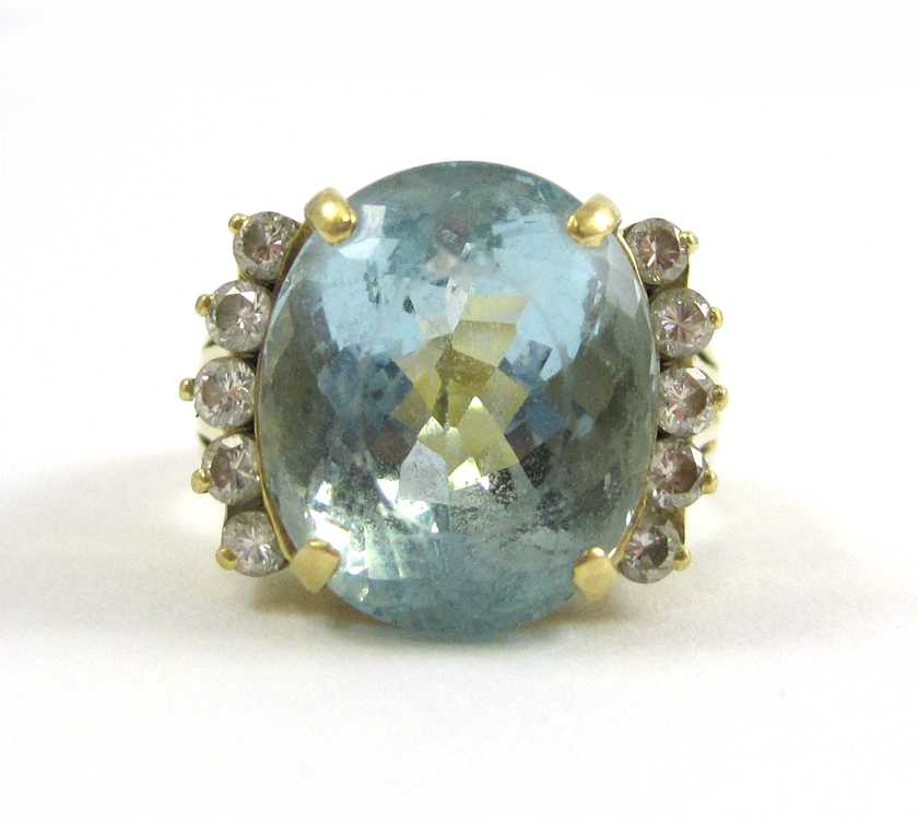 Appraisal: AQUAMARINE DIAMOND AND EIGHTEEN KARAT GOLD RING with five round-cut