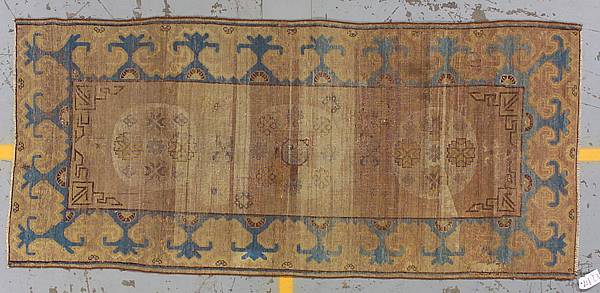 Appraisal: A Khotan rug size approximately ft in x ft in