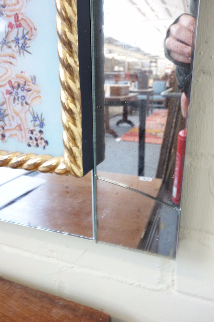 Appraisal: A rectangular glass wall mirror th century with chinoiserie border