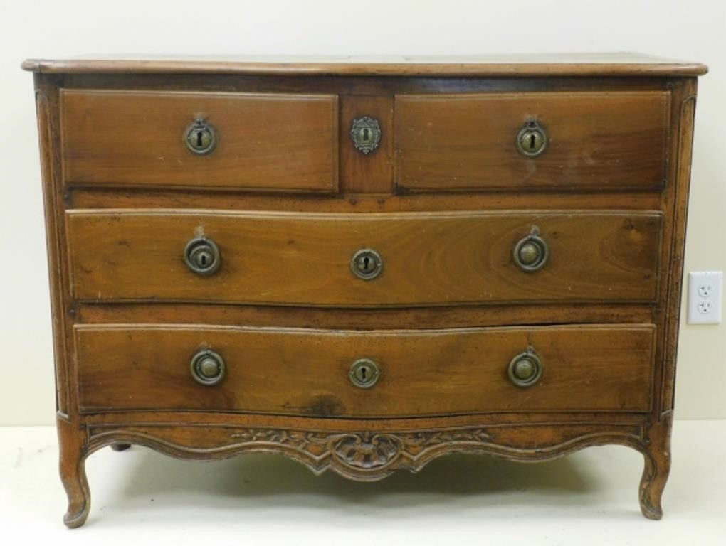 Appraisal: FRENCH WALNUT SERPENTINE FRONT CHEST THcentury Peg construction with carved