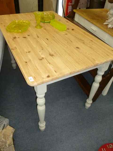 Appraisal: A PINE TABLE with painted turned legs wide