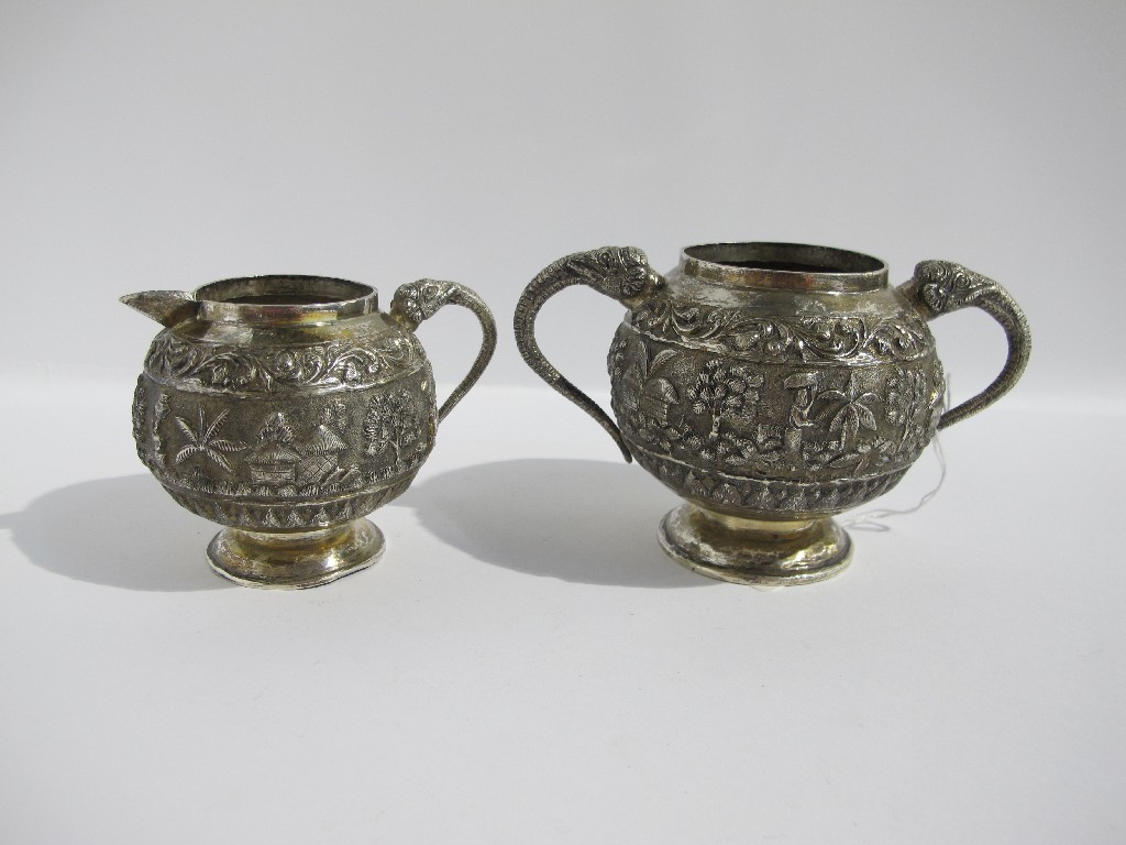 Appraisal: An Eastern white metal cream and sugar