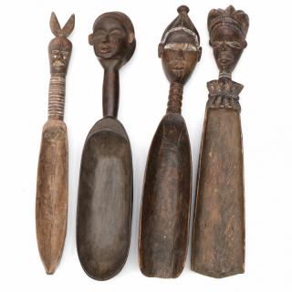 Appraisal: Four West African Figural Ladles probably Yoruba the first a