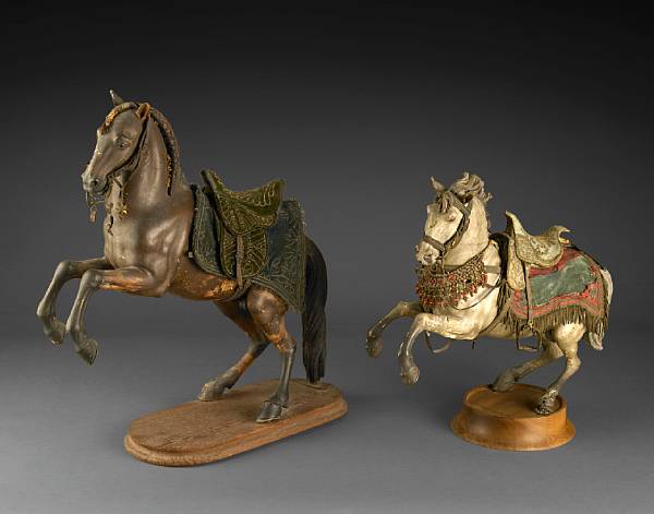 Appraisal: Two Spanish polychrome decorated models of horses th century Each