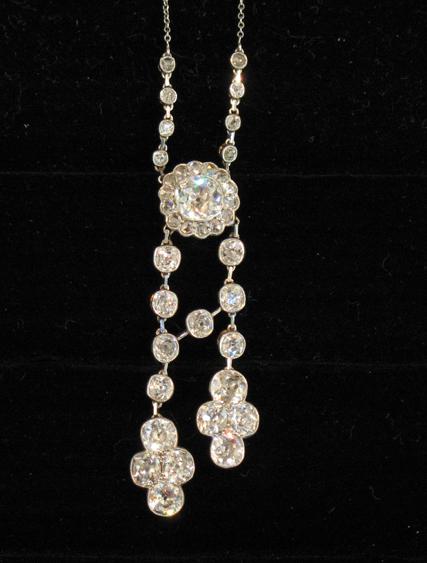 Appraisal: A BELLE EPOQUE DIAMOND PENDANT the central round old-cut stone