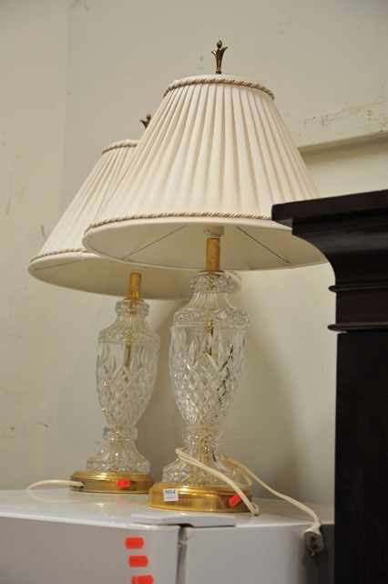 Appraisal: A PAIR OF CRYSTAL TABLE LAMPS WITH CREAM SHADES