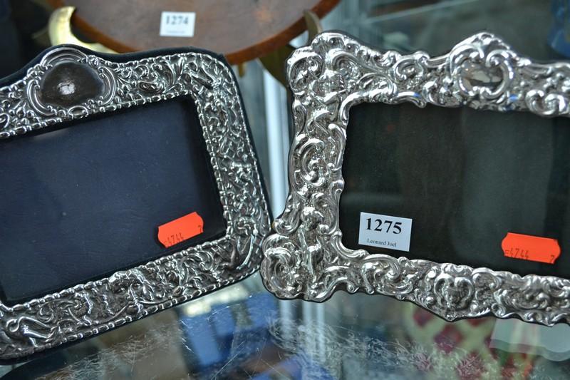 Appraisal: TWO STERLING SILVER EMBOSSED PHOTO FRAMES