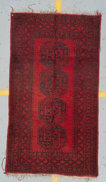 Appraisal: An Afghan rug size approximately ft in x ft in