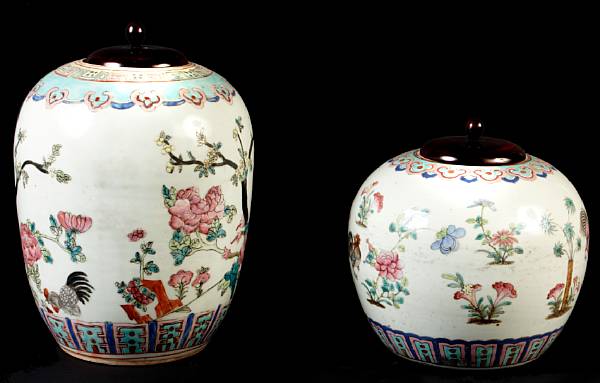 Appraisal: A group of four famille rose enameled porcelain ovoid jars