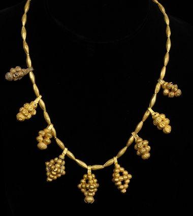 Appraisal: EARLY PERSIAN GOLD NECKLACE WITH GRAPE CLUSTER-FORM PENDANTS TOGETHER WITH