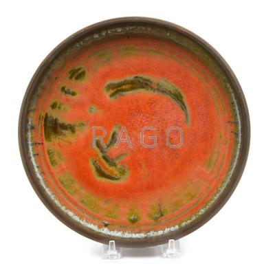 Appraisal: ROSE AND ERNI CABAT Glazed ceramic plate Arizona Signed dia