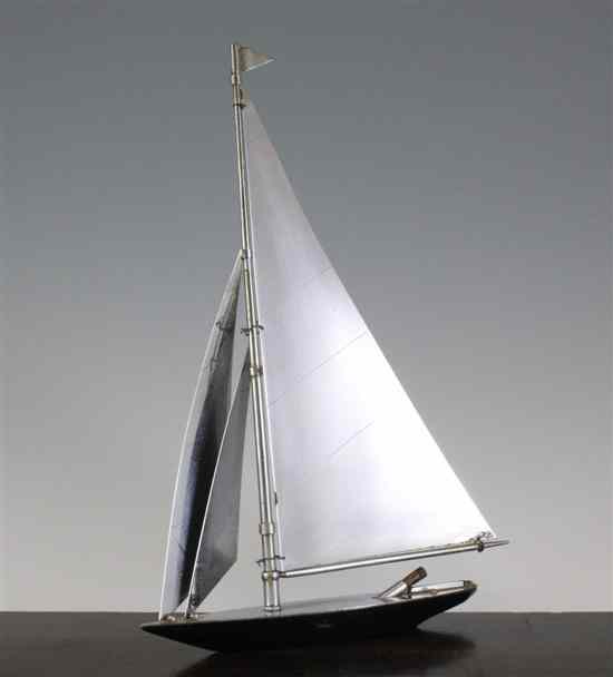 Appraisal: A Parker chrome table lighter modelled as a yacht design