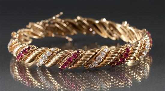 Appraisal: Lady's K yellow gold diamond and ruby bracelet diamonds approximately