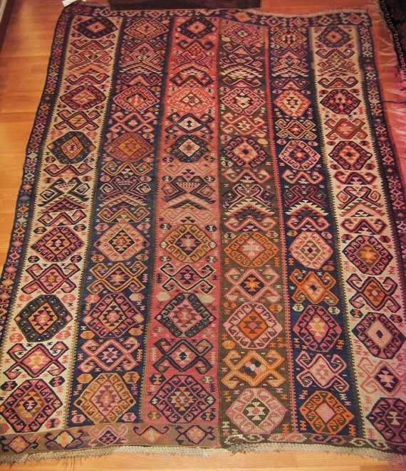 Appraisal: ANATOLIAN KILIM old Vertically striped central field with geometric figures