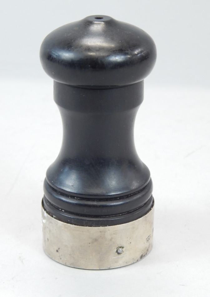 Appraisal: An Elizabeth II ebonised and silver mounted salt pot or