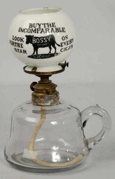 Appraisal: Bossy Brand Cigar Lighter Description Decorated on both sides Light