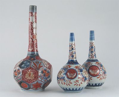 Appraisal: Three Japanese Imari bottle vases one faceted the others with