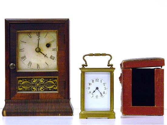 Appraisal: Two clocks French Carriage clock brass with glass panel sides