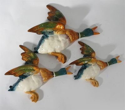 Appraisal: Flying Ducks' a set of three Beswick graduated wall plaques