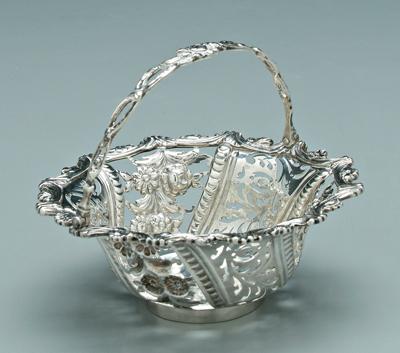 Appraisal: George III English silver basket round with openwork sides hinged