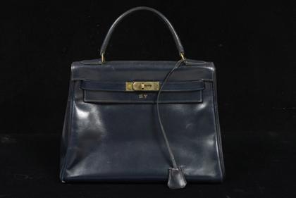 Appraisal: Navy blue cm Hermes Kelly bag s Classic form in