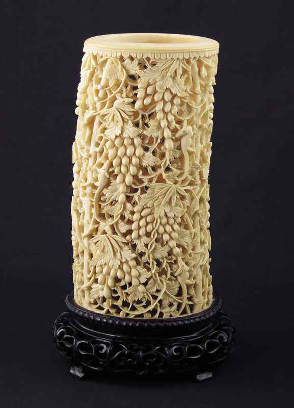 Appraisal: LARGE CARVED AND PIERCED IVORY BRUSH POT Carved and pierce