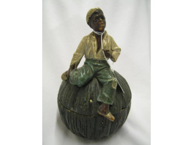 Appraisal: Black Americana Figural Pottery Tobacco Jar terra cotta boy with