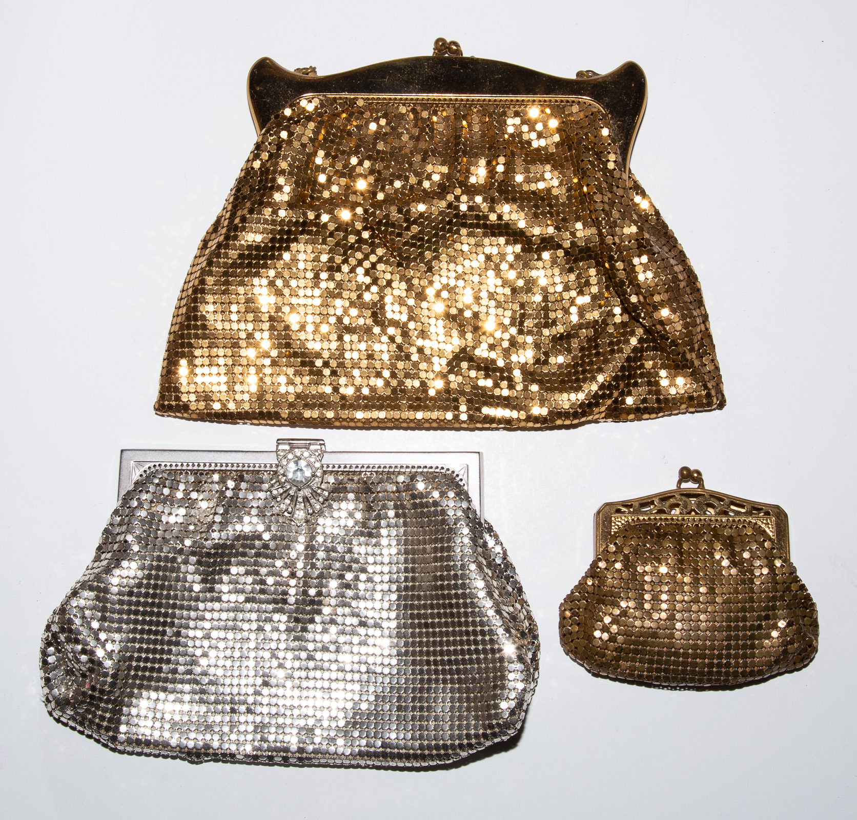 Appraisal: TWO WHITING DAVIS MESH EVENING BAGS and a coin purse