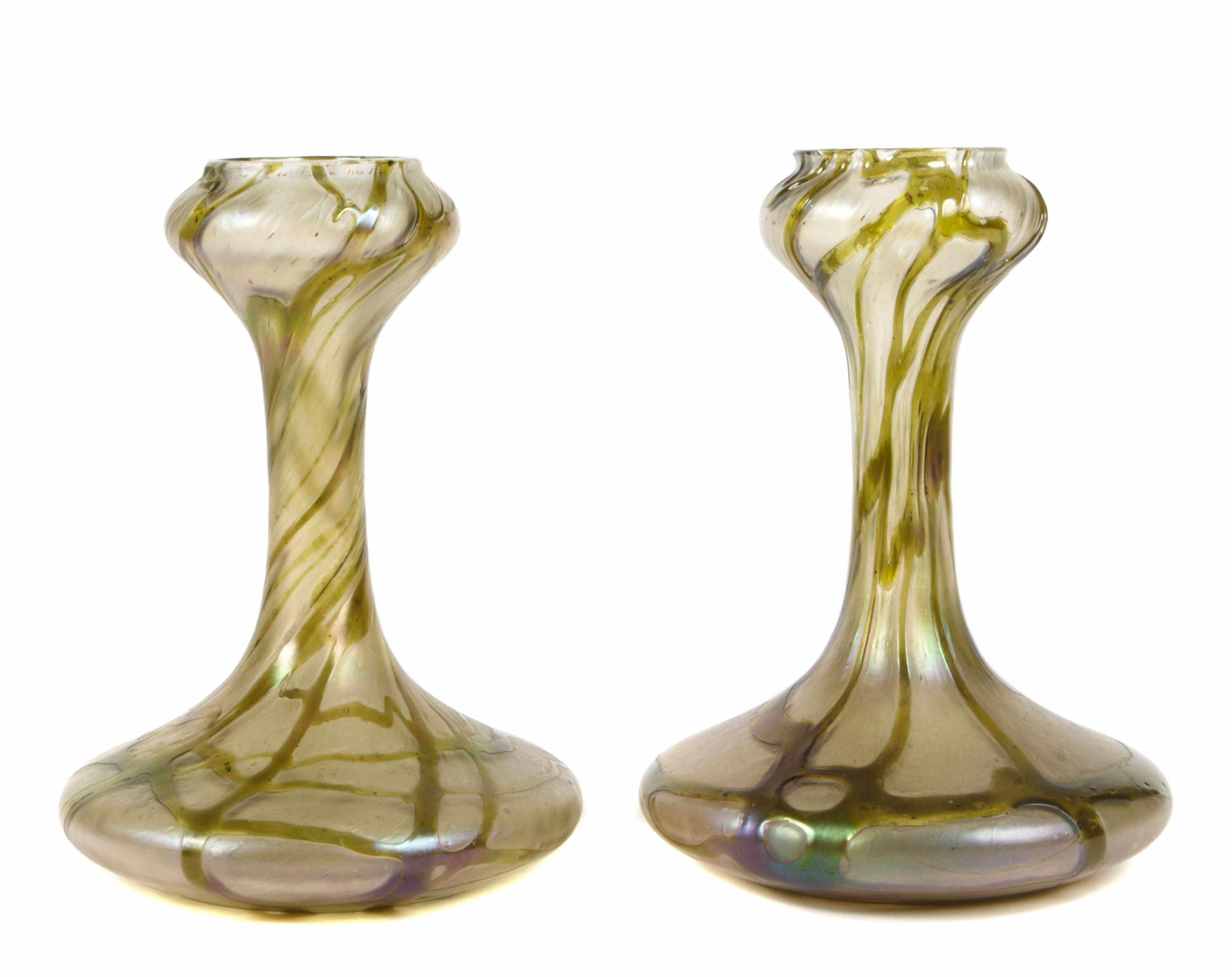 Appraisal: Two similar Austrian iridescent glass vases circa unsigned height in