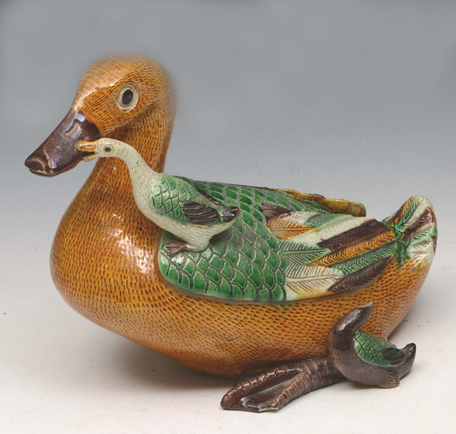 Appraisal: A POLYCHROME PORCELAIN MODEL OF A DUCK and two ducklings