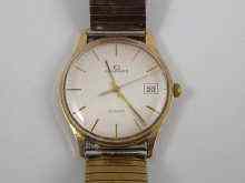 Appraisal: A ct gold Garrard quartz movement gent's watch with sweep