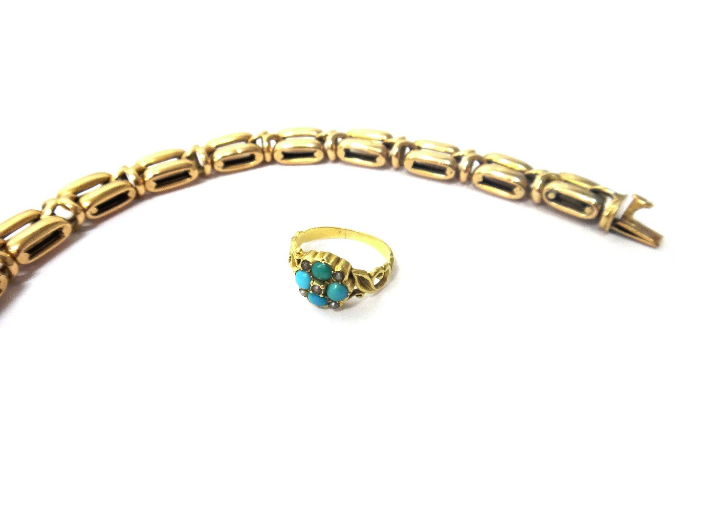 Appraisal: A gold bracelet in a twin oval and entwined design