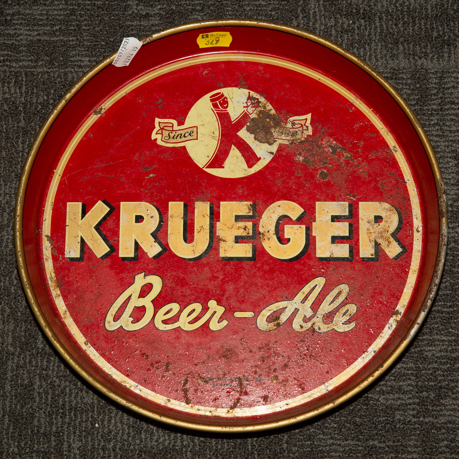 Appraisal: KRUEGER TIN LITHOGRAPHED ROUND BEER TRAY Circa in Diam