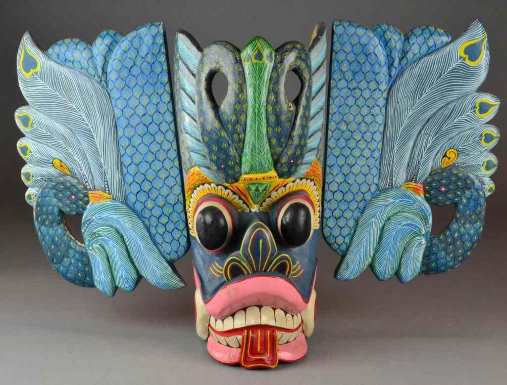 Appraisal: African Style Wood Mask Sri Lanka Polychrome painted wooden mask