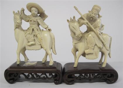 Appraisal: Two Chinese elephant ivory mounted figuresComprising a seated elder in