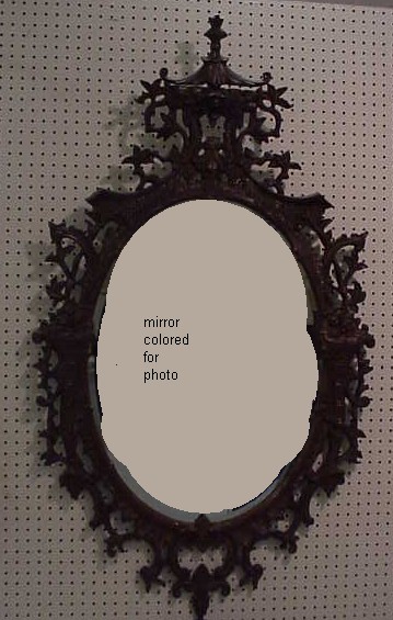 Appraisal: Chinese Chippendale style wall mirror oval frame with flowers leaves