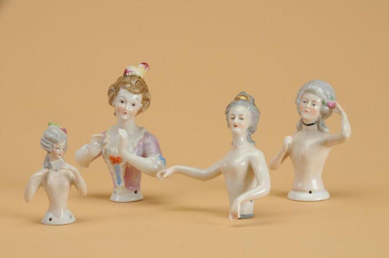 Appraisal: Lot Four Half Dolls Germany ca glazed porcelain pin cushion