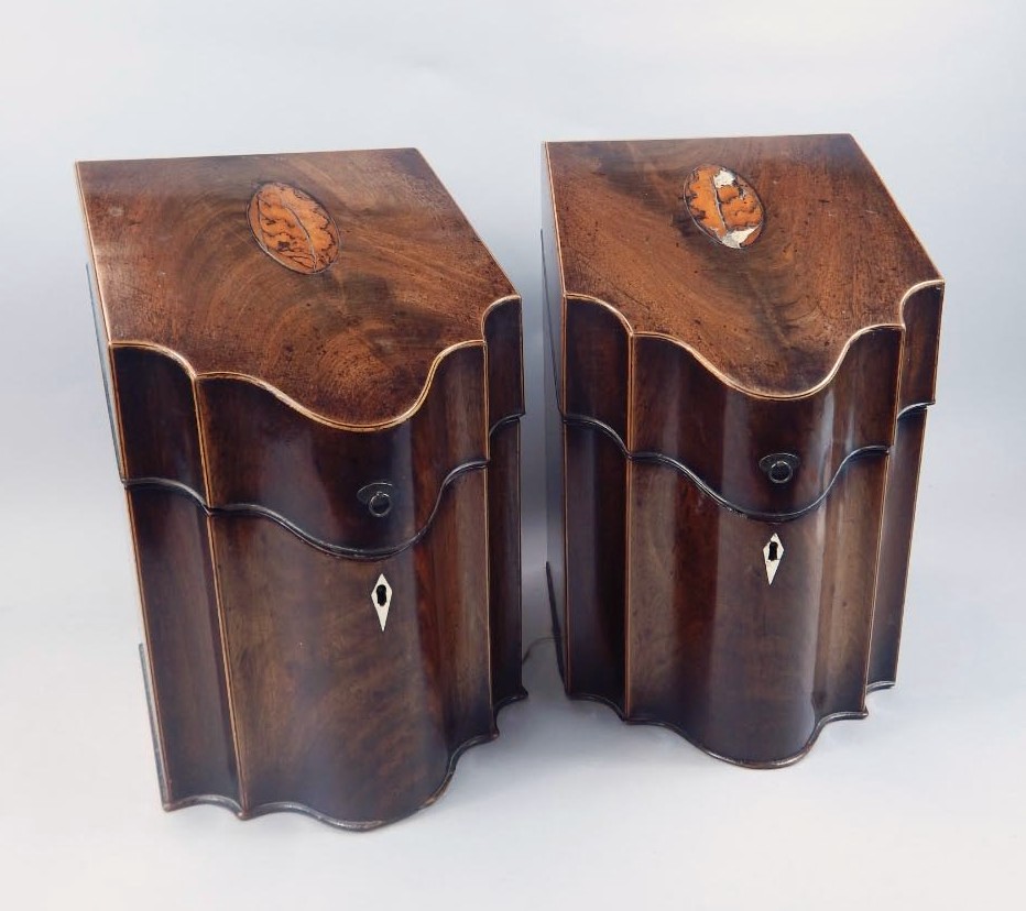 Appraisal: A pair of George III mahogany knife boxes each shaped