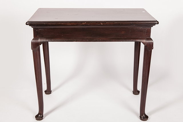 Appraisal: A GEORGE III MAHOGANY SIDE TABLE with tapering supports and