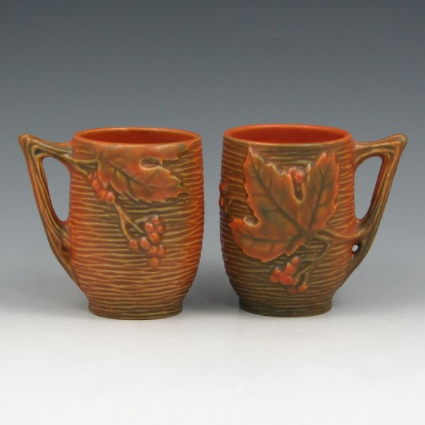 Appraisal: Two Roseville Bushberry handled mugs or cups in brown Marked