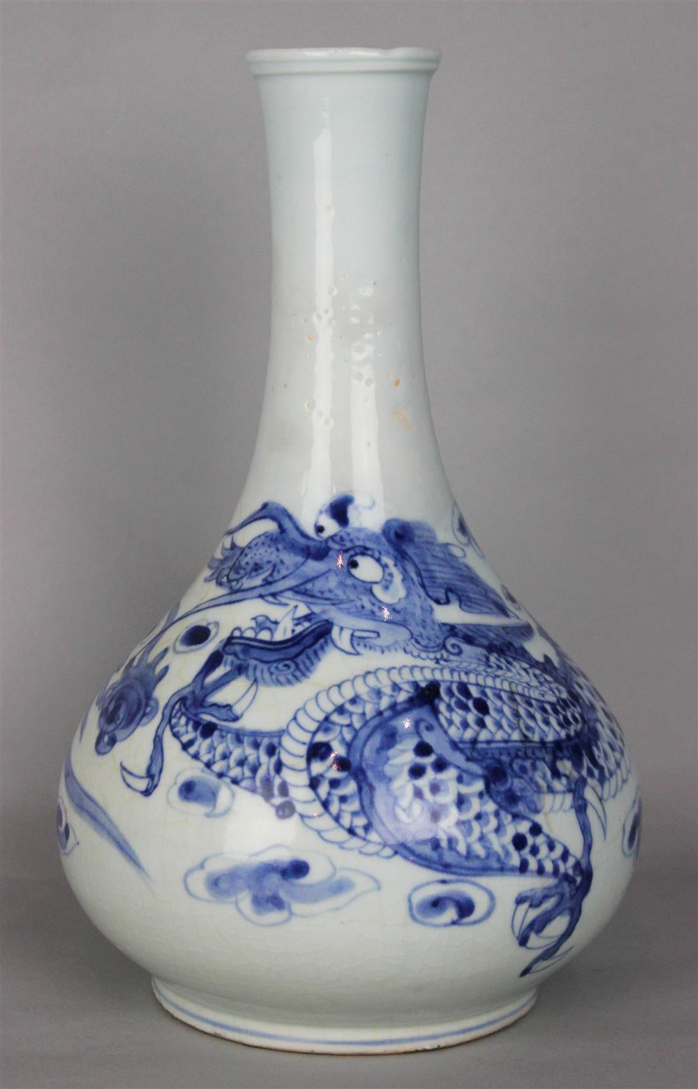 Appraisal: KOREAN BLUE AND WHITE DRAGON VASE of bottle shape and