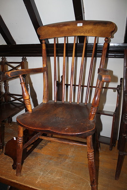 Appraisal: A VICTORIAN ELM AND ASH STICK BACK KITCHEN ELBOW CHAIR