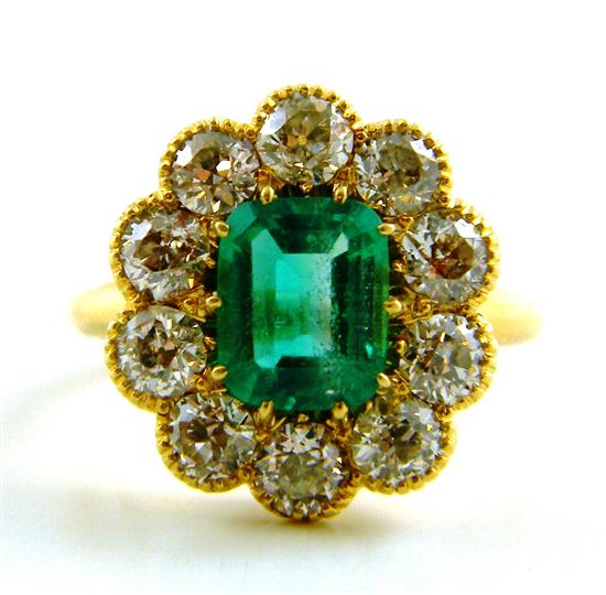 Appraisal: JEWELRY K yellow gold emerald cut emerald measures approximately mm