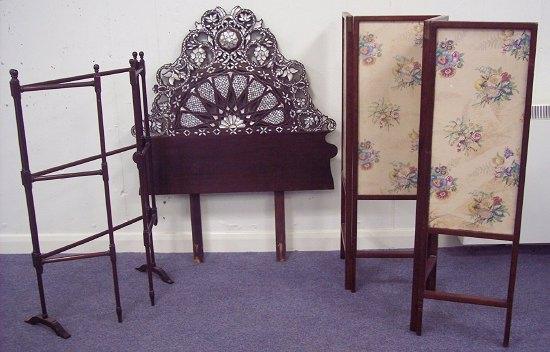 Appraisal: A mahogany framed four-fold screen cm high a towel rail