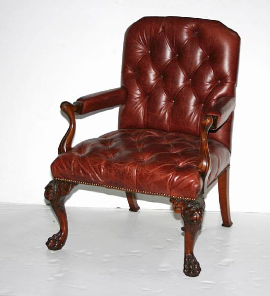 Appraisal: A Geeorge III style leather upholstered arm chair mid th