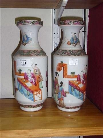 Appraisal: A PAIR OF CHINESE CANTON BALUSTER VASES painted with figures