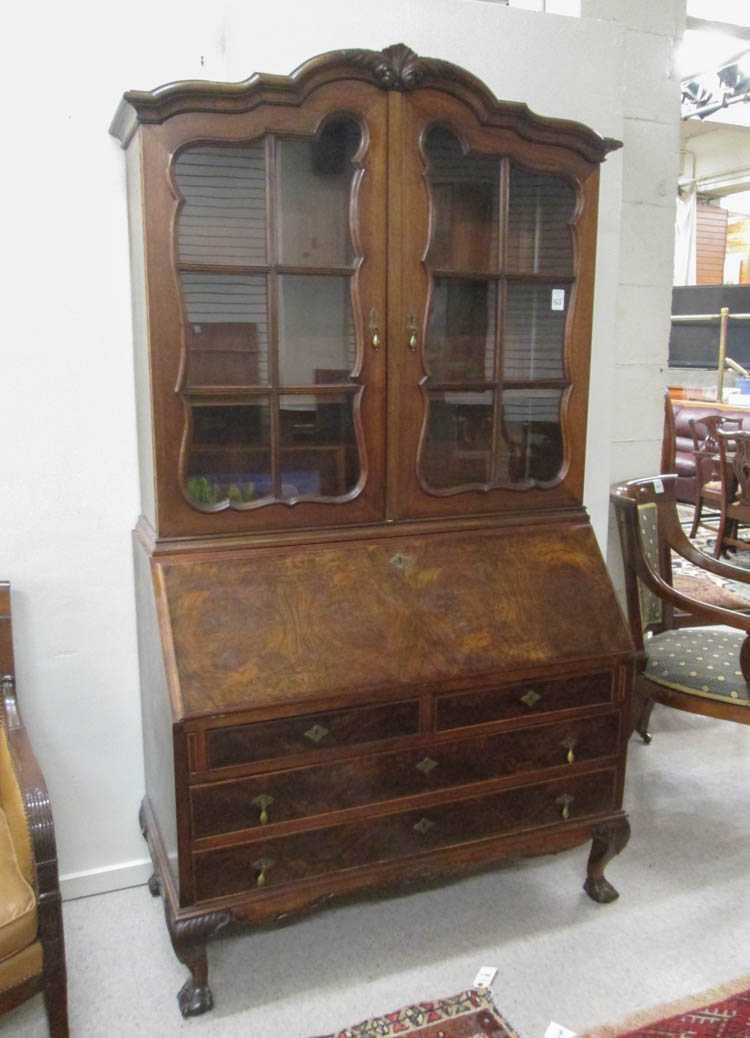 Appraisal: CHIPPENDALE REVIVAL MAHOGANY AND BURL WALNUT SECRETARY BOOKCASE Continental early