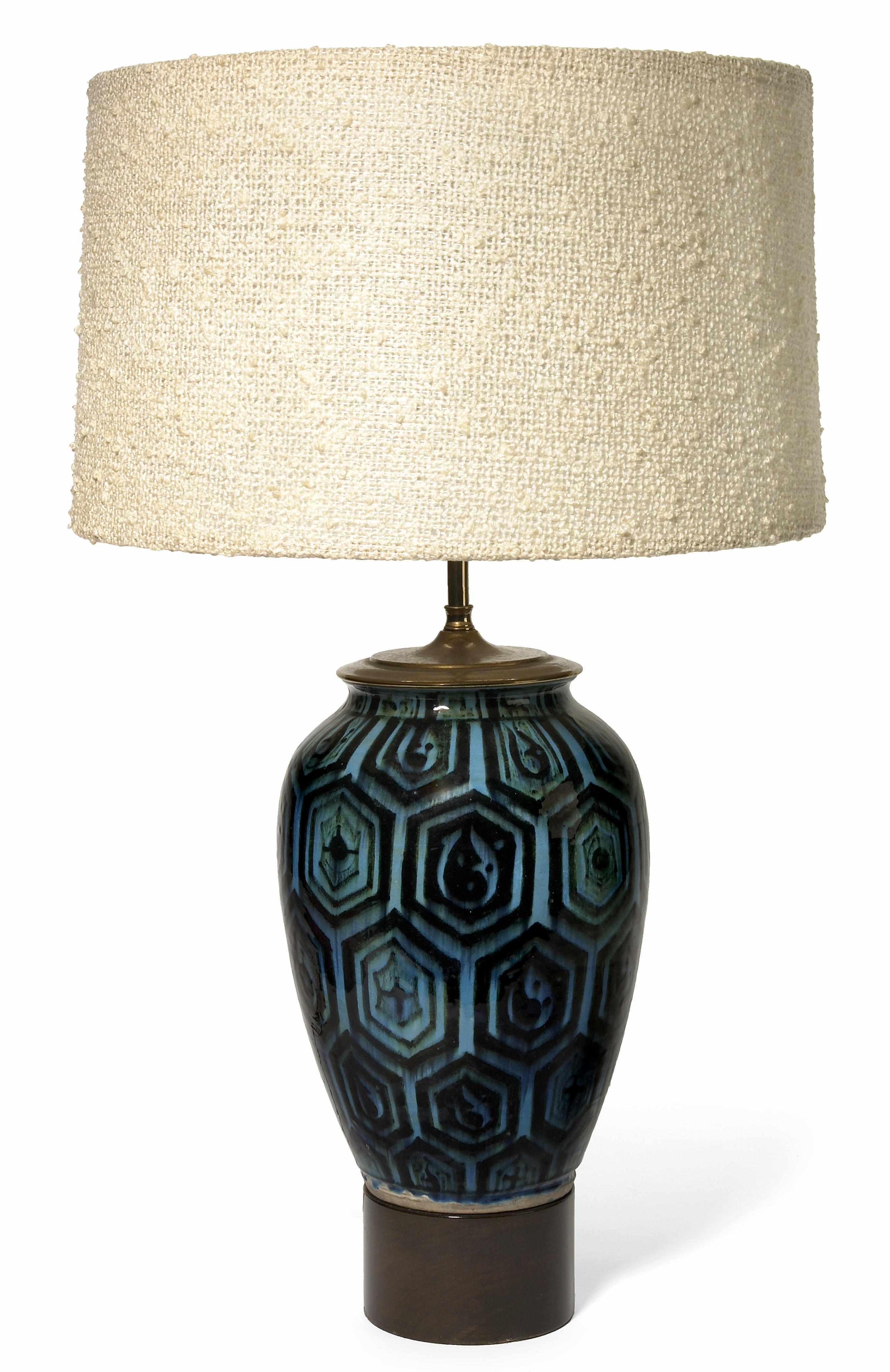 Appraisal: A William Haines glazed earthenware geometric lamp circa with walnut