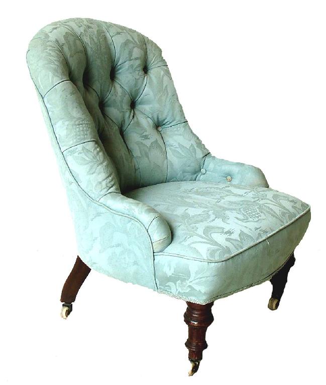 Appraisal: Victorian button back pale blue upholstered nursing chair upon turned