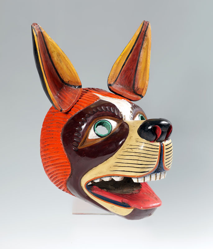 Appraisal: NORTHWEST STYLE CARVED WOLF DOG MASK Carved wood figural mask